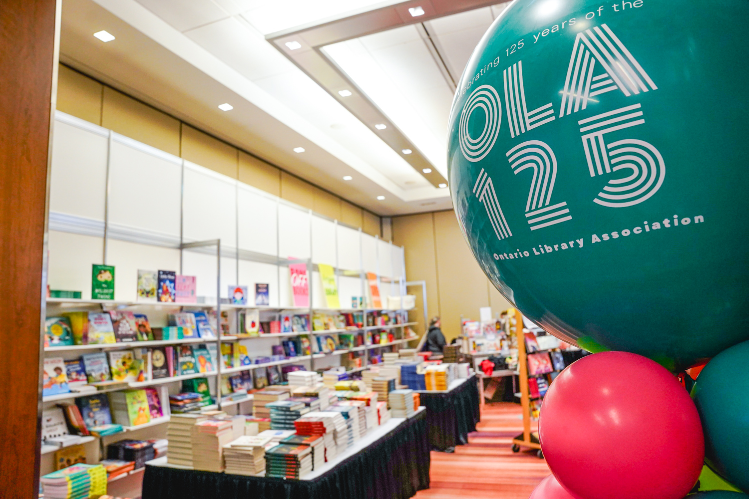 OLA 125 Ballon looking on to the library marketplace